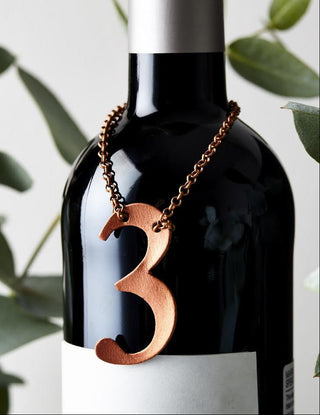 Perfect as a 3rd anniversary wedding gift - a leather bottle tag