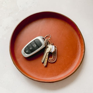 Circle cognac leather tray handmade by Joanna From Parkin and Lewis