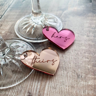 Melting heart wine glass charm in rose gold and hot pink.