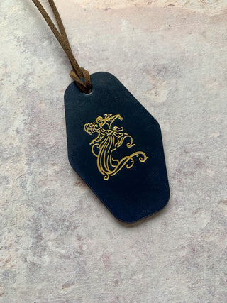 Bespoke cloakroom tags with your company logo on.