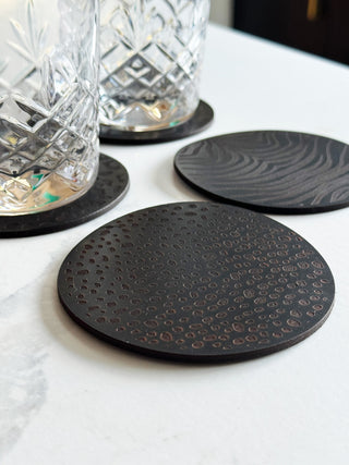 Set of 4 Black Animal Print Leather Coasters.