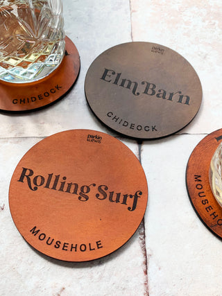 Tan and brown leather coasters perfect house warming present.