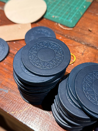 Handmade navy leather cloakroom tags for the Savoy Hotel  in london