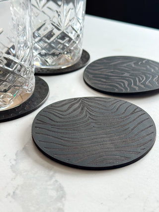 Set of 4 Black Animal Print Leather Coasters.