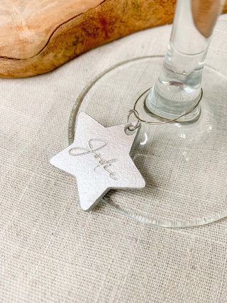 Silver personalised star glass charm.