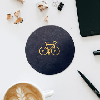 Round navy leather hobby coaster is the perfect small gift for a keen cyclist